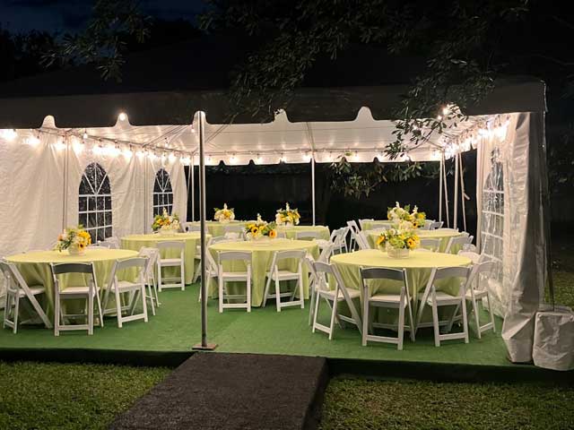 A home backyard reception with tents from Acme Rental